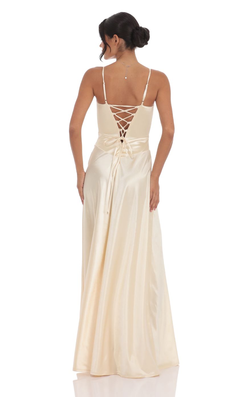 Picture Satin Square Neck Maxi Dress in Champagne. Source: https://media-img.lucyinthesky.com/data/Nov24/850xAUTO/1a01dc2c-29bd-4c83-a48a-801b1acbc6cd.jpg