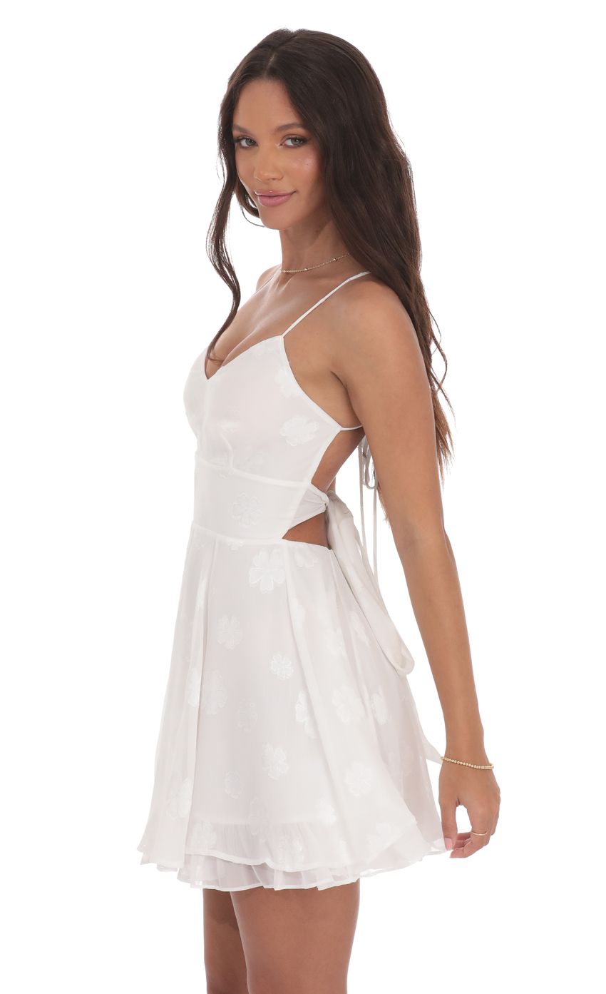 Picture Fit and Flare Dress in Floral White. Source: https://media-img.lucyinthesky.com/data/product-media/850xAUTO/30cc658f-f46e-48e5-babc-a475d10e4ab7.jpg