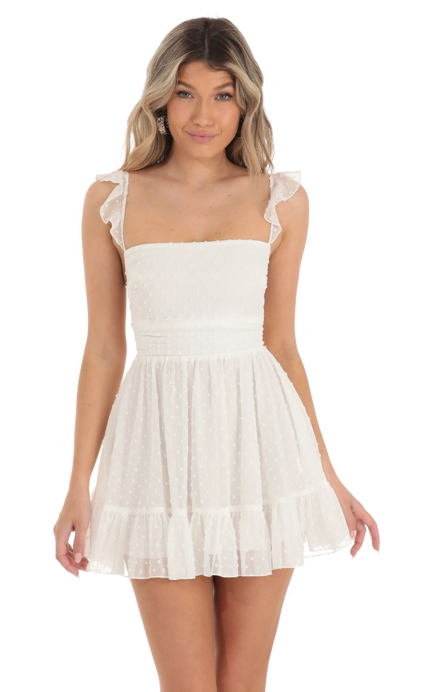 Picture Dotted A-line Dress in White. Source: https://media-img.lucyinthesky.com/data/Apr23/850xAUTO/35ac5bad-f4ed-4434-8749-bdbaf302891f.jpg
