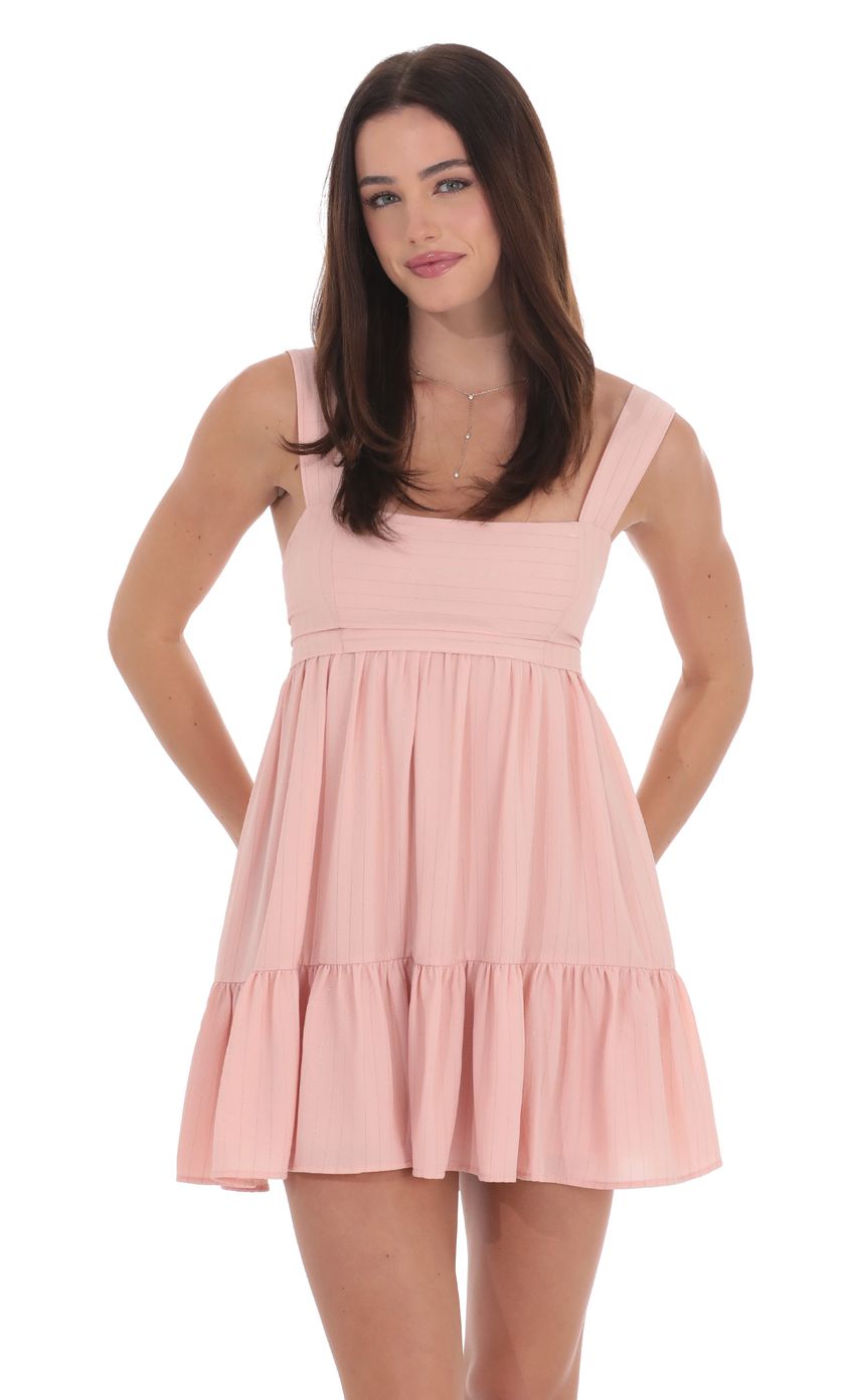 Picture Shimmer Striped Babydoll Dress in Pink. Source: https://media-img.lucyinthesky.com/data/product-media/850xAUTO/39131f5e-e314-4307-9070-2940f7572ea6.jpg