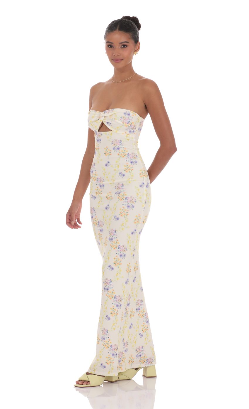 Picture Floral Ribbed Cutout Twist Maxi Dress in Yellow. Source: https://media-img.lucyinthesky.com/data/product-media/850xAUTO/5a5dcd67-3390-4347-ad61-0ca11b47bcea.jpg
