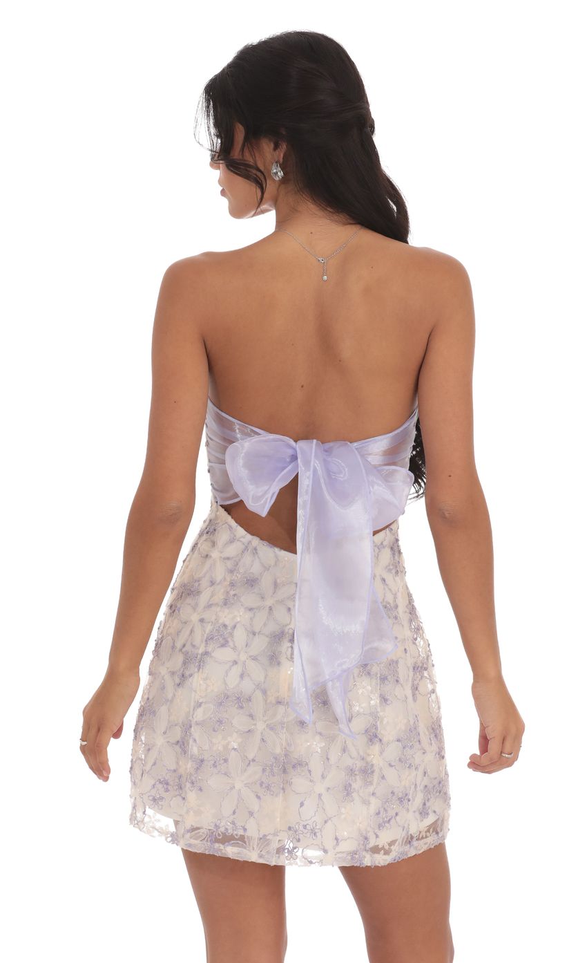 Picture Floral Sequin Strapless Fit and Flare Dress in White. Source: https://media-img.lucyinthesky.com/data/Nov24/850xAUTO/5fd281c9-7d9b-400d-97e5-1f6d21a47323.jpg