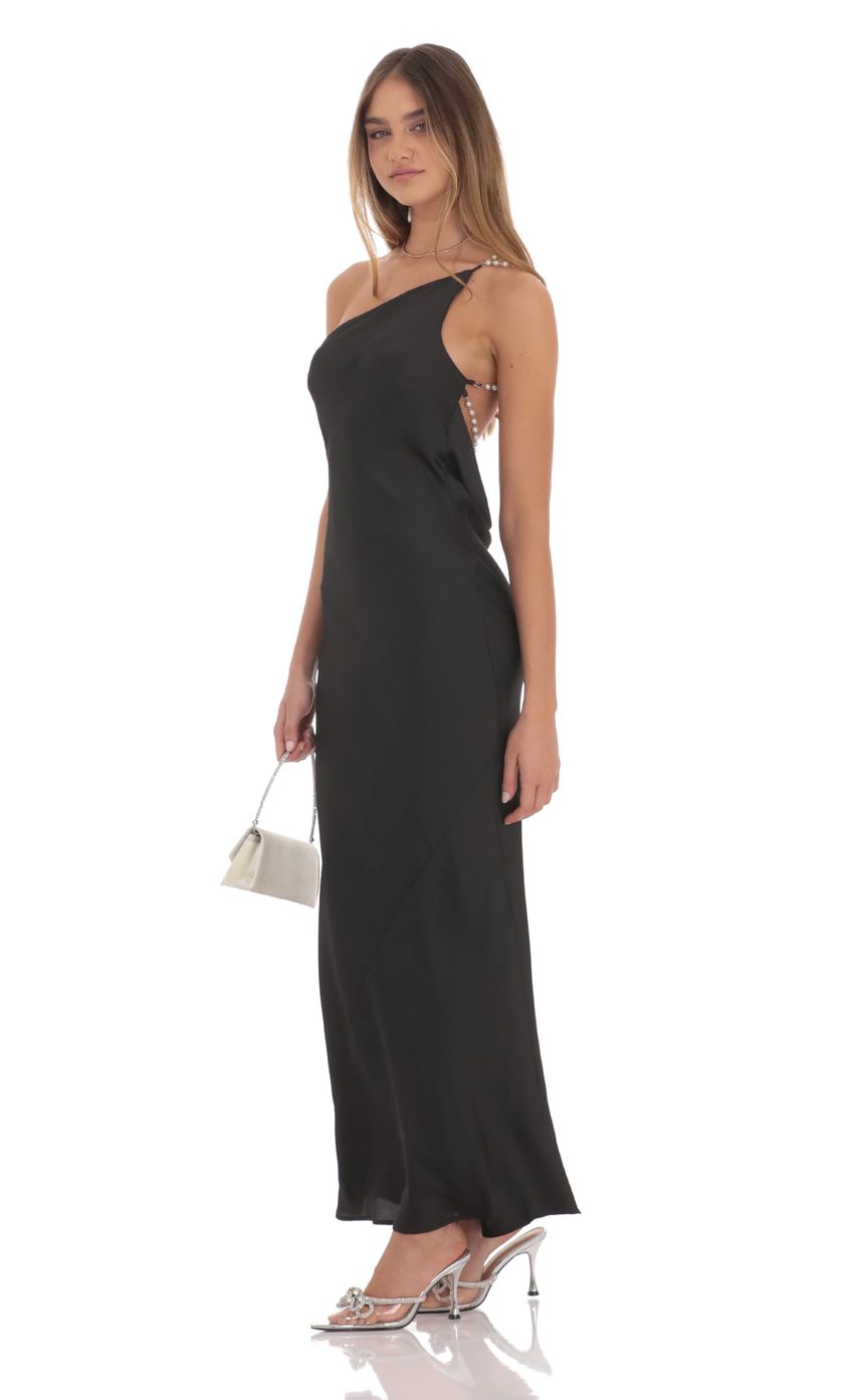 Picture One Shoulder Pearl Satin Maxi Dress in Black. Source: https://media-img.lucyinthesky.com/data/product-media/850xAUTO/60424209-c9bd-4f36-912c-0795ee8a7271.jpg