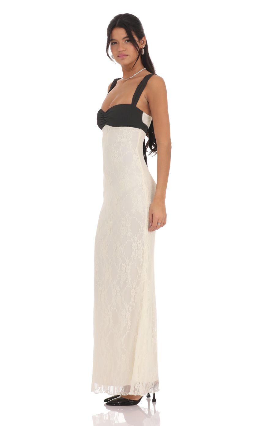 Picture Two-Toned Lace Maxi Dress in Cream. Source: https://media-img.lucyinthesky.com/data/product-media/850xAUTO/70cc1d7d-2aee-46f2-9609-c4be43a231f9.jpg