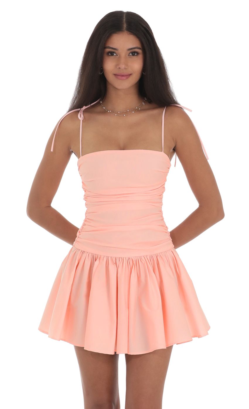 Picture Ruched Fit and Flare Dress in Pink. Source: https://media-img.lucyinthesky.com/data/product-media/850xAUTO/87316d5d-25a0-4f02-9b60-8e15195813d0.jpg