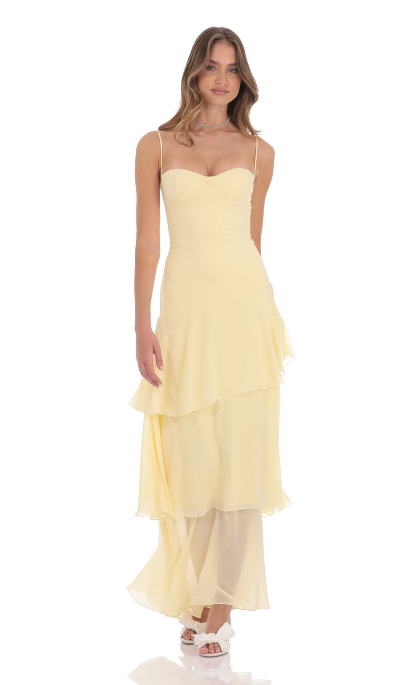Picture Long Ruffle Maxi Dress in Yellow. Source: https://media-img.lucyinthesky.com/data/product-media/850xAUTO/9af8fb26-1541-43ef-8d9b-4910c4ec4b3e.jpg