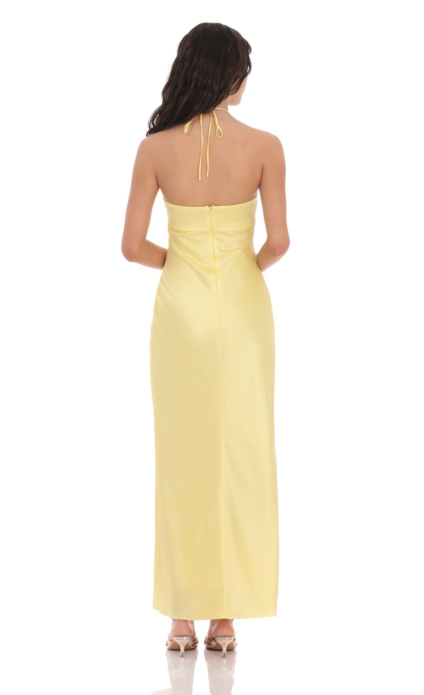 Picture Satin Halter Flower Maxi Dress in Yellow. Source: https://media-img.lucyinthesky.com/data/product-media/850xAUTO/a34498a7-39f3-4c97-84b5-a1953b4b1aec.jpg