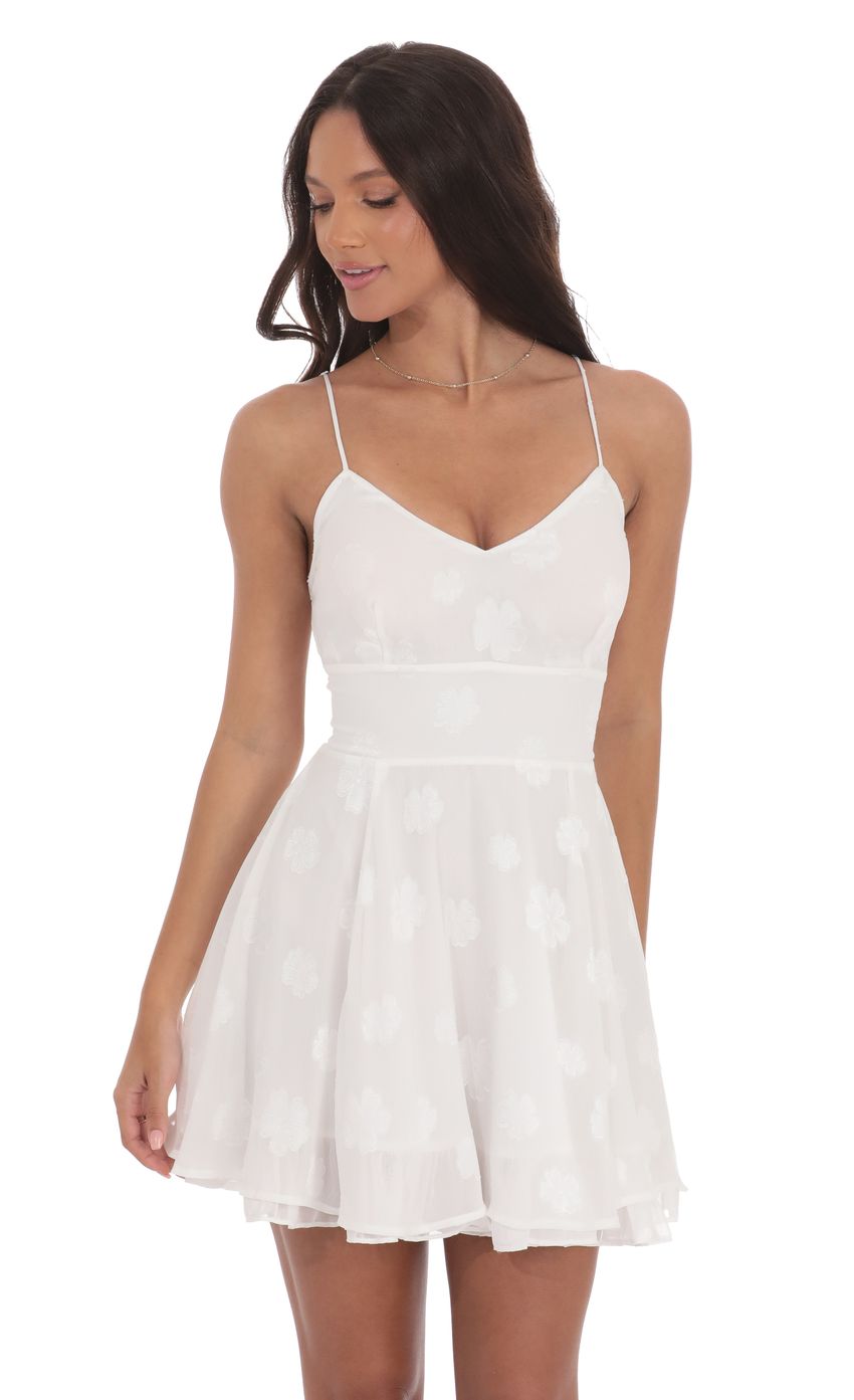 Picture Fit and Flare Dress in Floral White. Source: https://media-img.lucyinthesky.com/data/product-media/850xAUTO/ac3b9840-44df-463d-8474-b4427ea49945.jpg