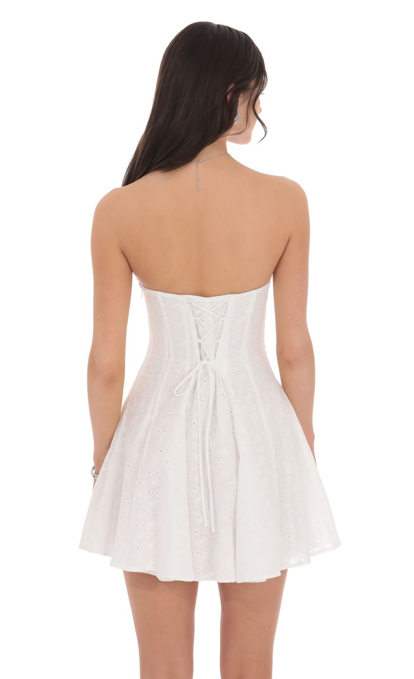 Picture Eyelet Floral Strapless Dress in White. Source: https://media-img.lucyinthesky.com/data/product-media/850xAUTO/cf629f2e-1707-42c2-afb7-e3419f8bc896.jpg