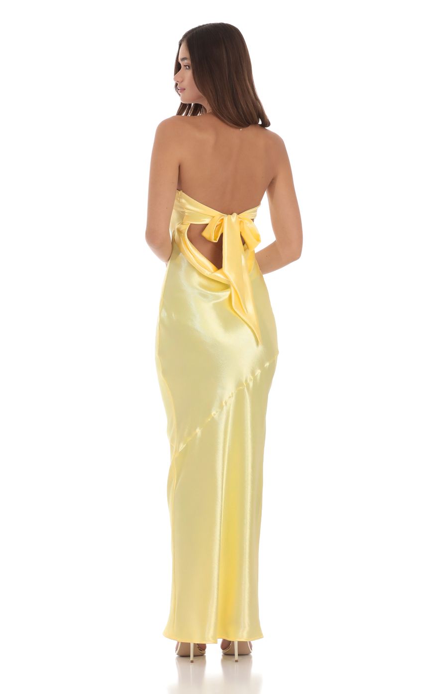 Picture Strapless Satin Open Back Maxi Dress in Yellow. Source: https://media-img.lucyinthesky.com/data/product-media/850xAUTO/d5ac8a27-dbd3-492a-b82f-8a376dd051ce.jpg