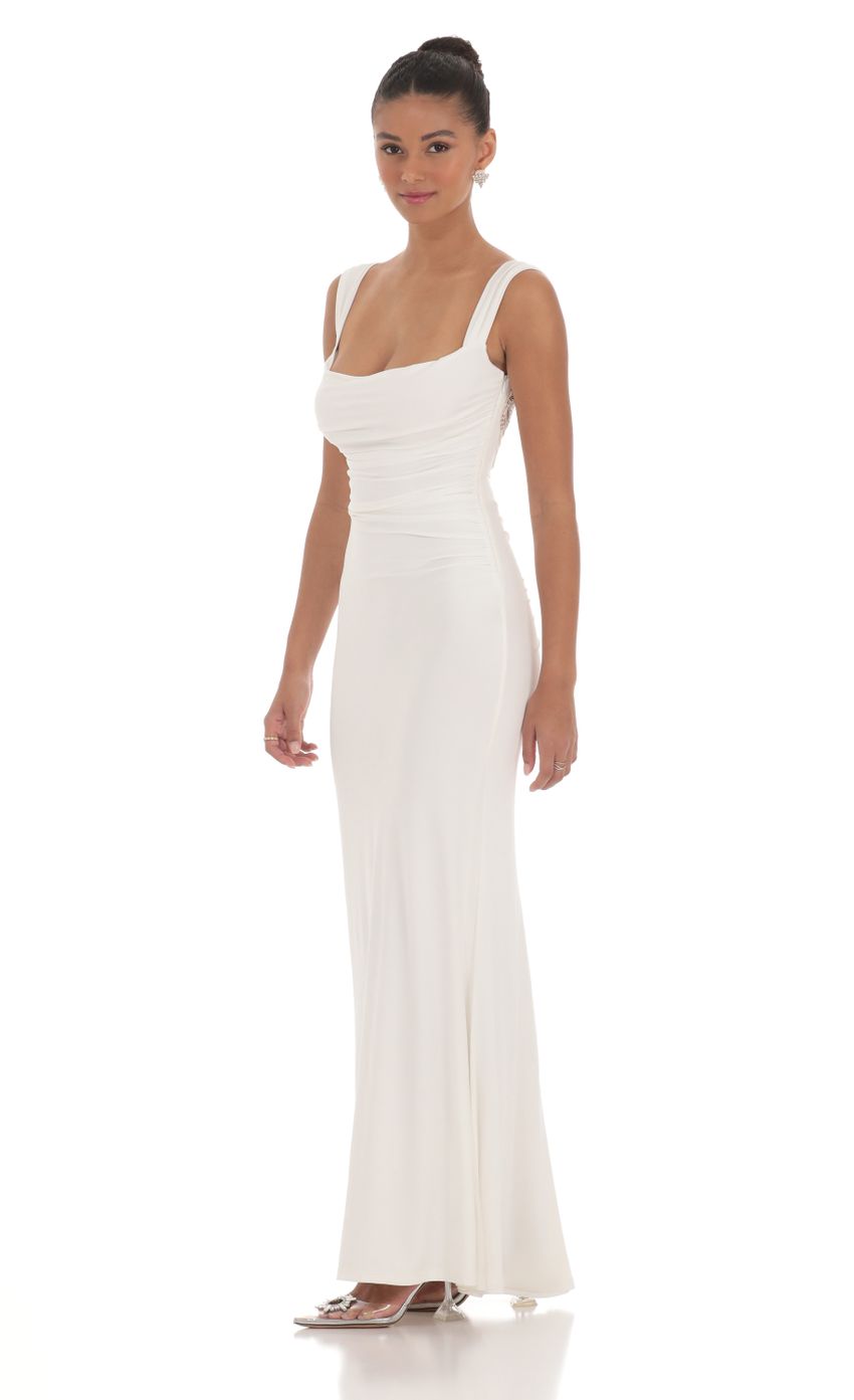Picture Back Sequin Butterfly Maxi Dress in White. Source: https://media-img.lucyinthesky.com/data/Mar24/850xAUTO/d80f3d9d-053e-4192-81b6-218e498525aa.jpg