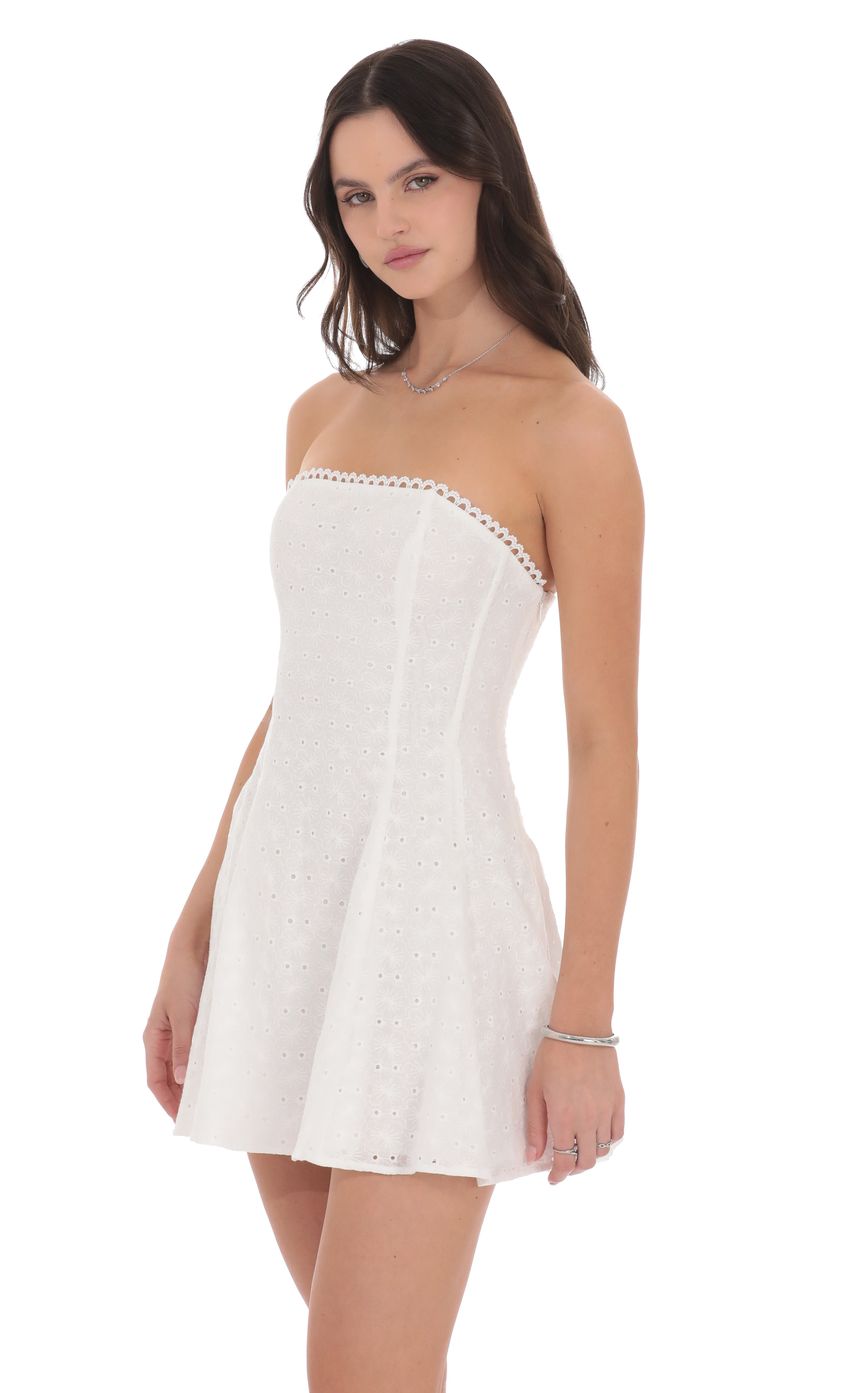 Picture Eyelet Floral Strapless Dress in White. Source: https://media-img.lucyinthesky.com/data/product-media/850xAUTO/d91658a3-b576-4f04-adfa-a48ad47946c8.jpg