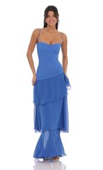 Picture Long Ruffle Maxi Dress in Blue. Source: https://media-img.lucyinthesky.com/data/product-media/850xAUTO/d9e31c34-759a-4236-b85a-b6ddaa6f9b01.jpg