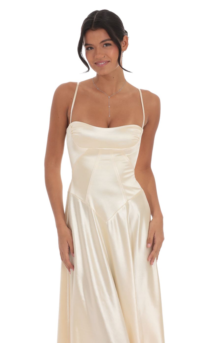 Picture Satin Square Neck Maxi Dress in Champagne. Source: https://media-img.lucyinthesky.com/data/Nov24/850xAUTO/e40bbb1f-13e3-48bd-b927-7193c20bacb1.jpg