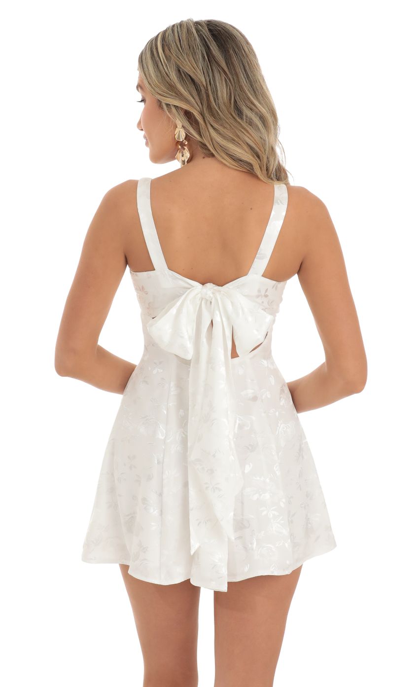 Picture Floral Jacquard A-Line Dress in White. Source: https://media-img.lucyinthesky.com/data/May23/850xAUTO/e7df84df-d271-440a-ba23-2c88a78faa65.jpg