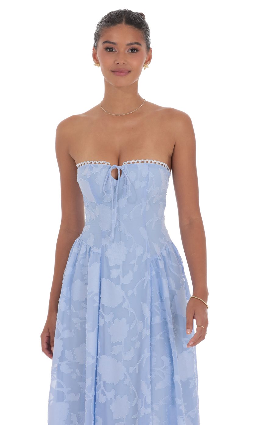 Picture Floral Lace-Up Maxi Dress in Light Blue. Source: https://media-img.lucyinthesky.com/data/product-media/850xAUTO/ec875707-b27a-4c51-bcb1-55255c2f9395.jpg